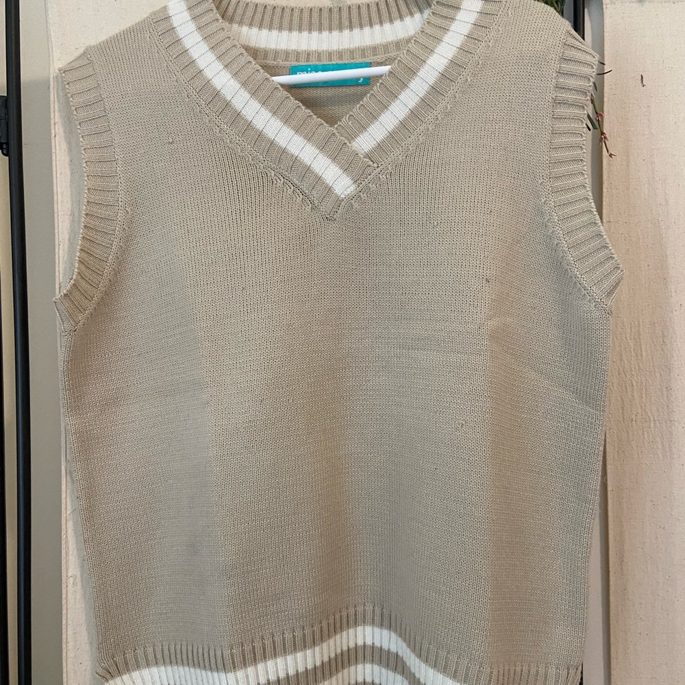beige sweater vest